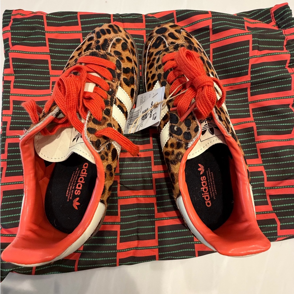 FAKE——-Adidas Leopard Print Sneakers with Red Accents